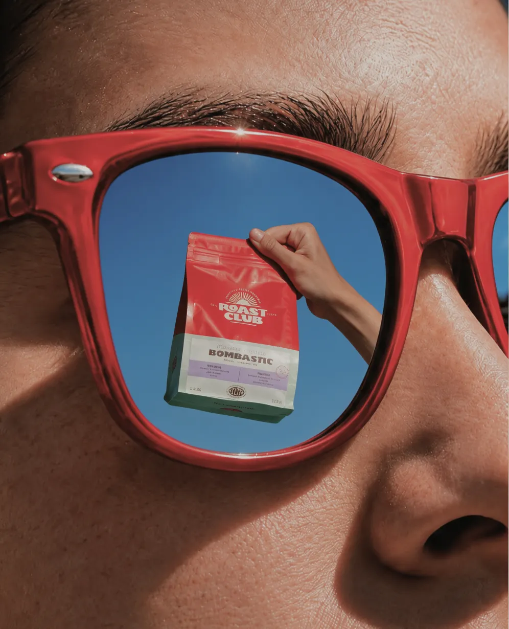 Gafas rojas con el reflejo de la bolsa