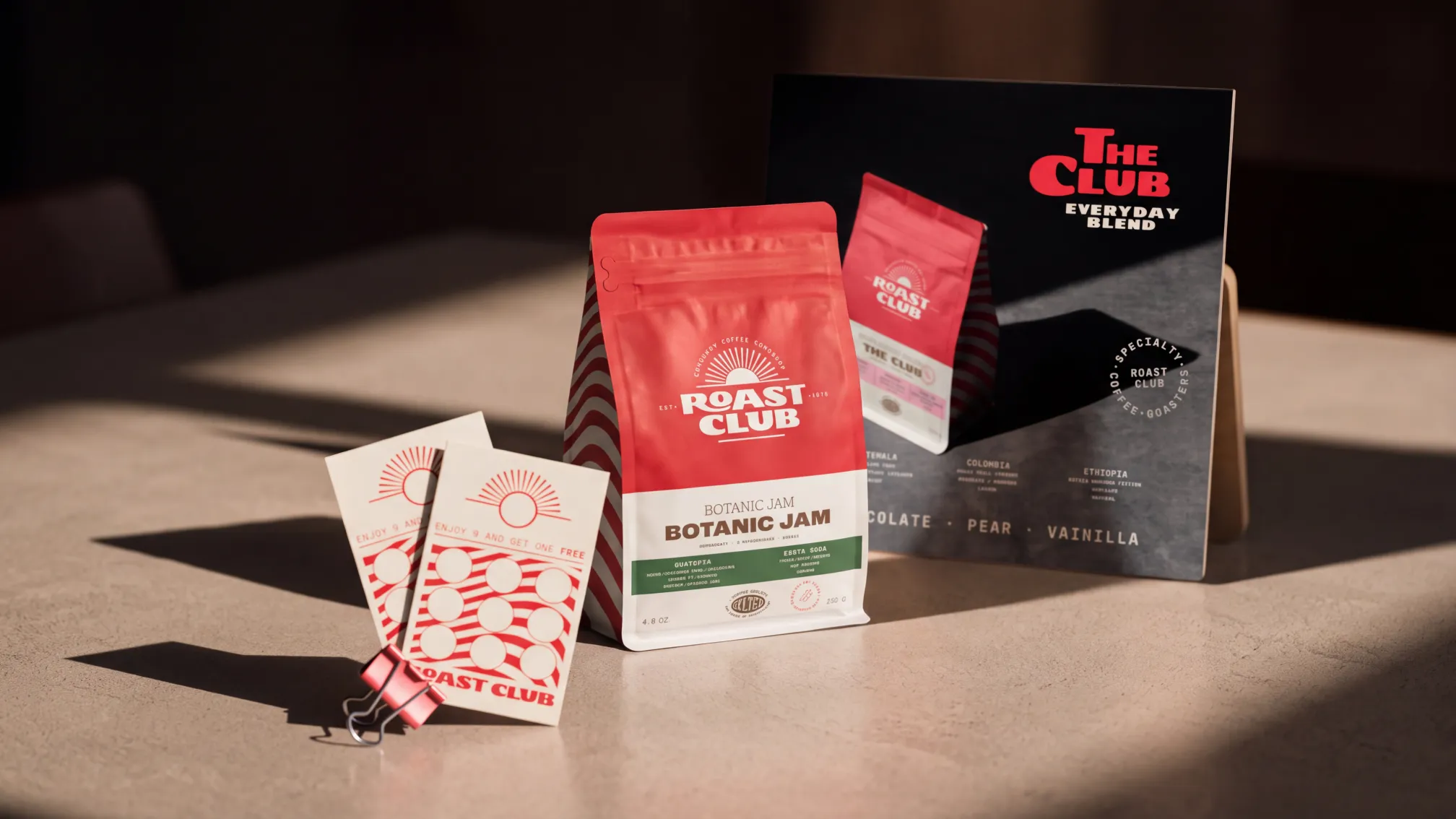 Cartel de THE CLUB Everyday Blend con la bolsa de café